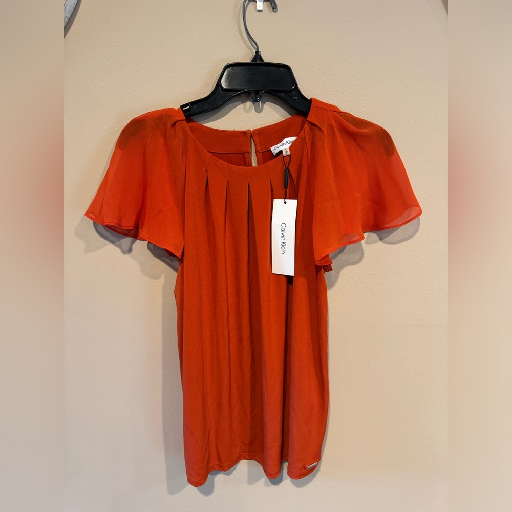 Brand new!! Women’s dress shirt w/ tags